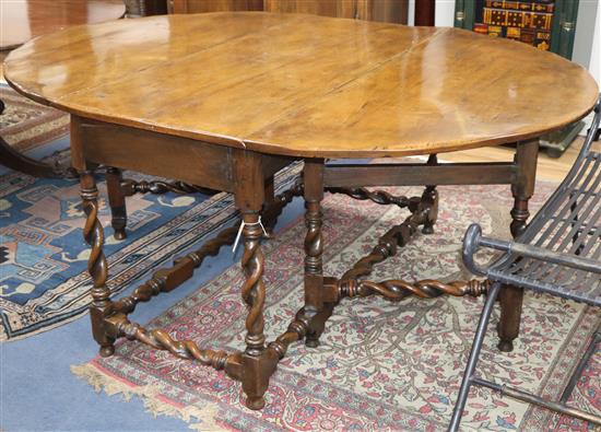 An 18th century and later fruitwood gateleg dining table W.176cm